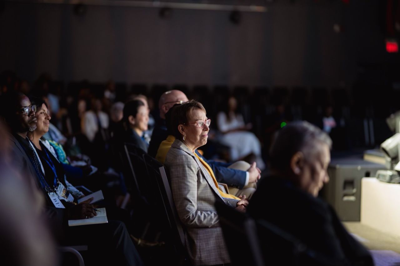 Engaged guests listening during a GODfidence Conference session