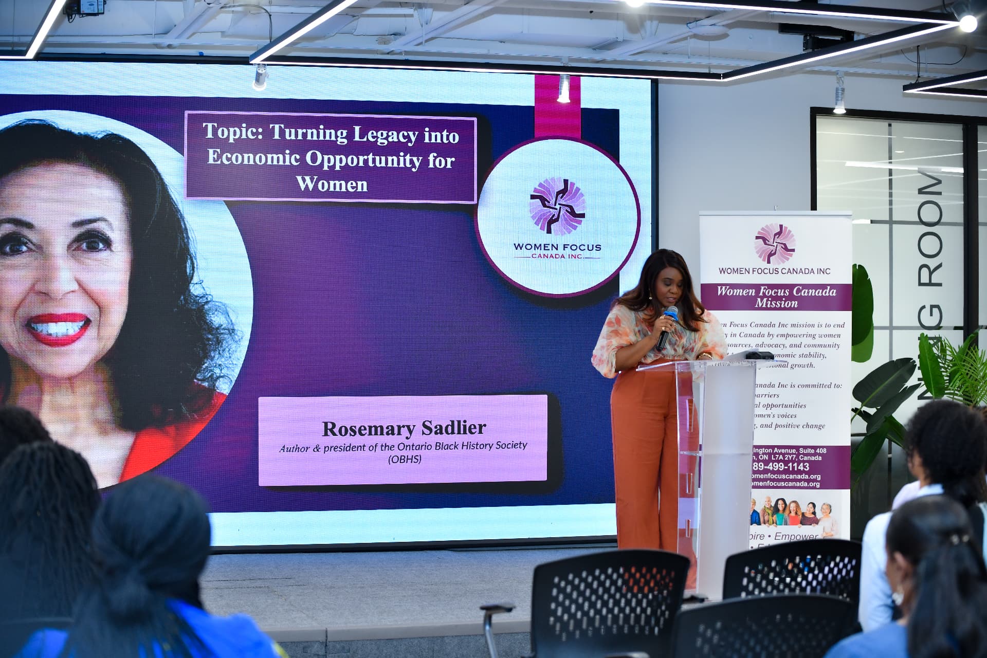 Rosemary Sadlier speaking at a Women Focus Canada event about economic opportunity for women