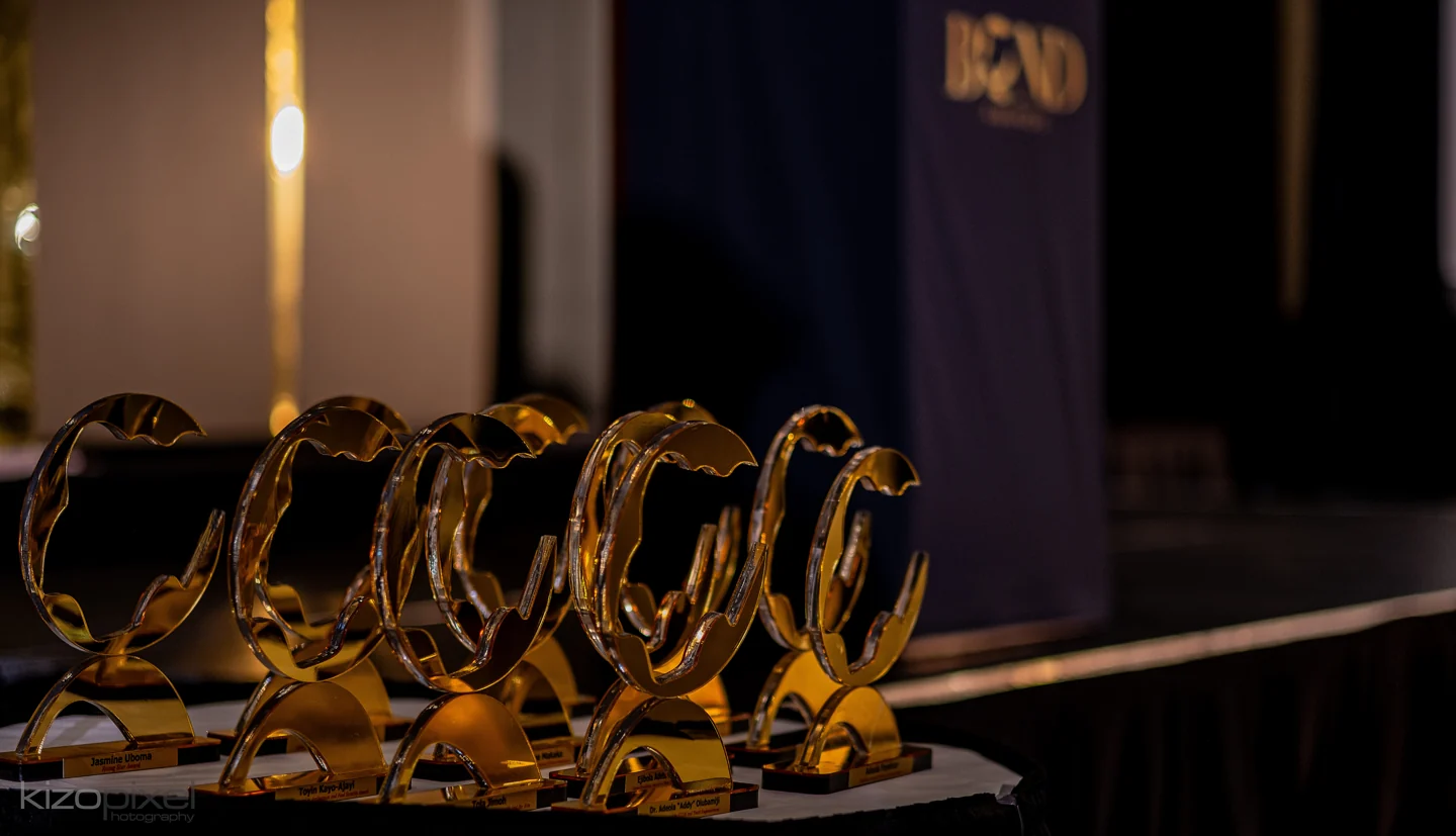 Gold Bond Awards trophies displayed at the event